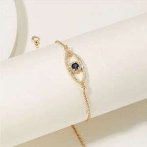 Elegant Gold and Blue Bracelet